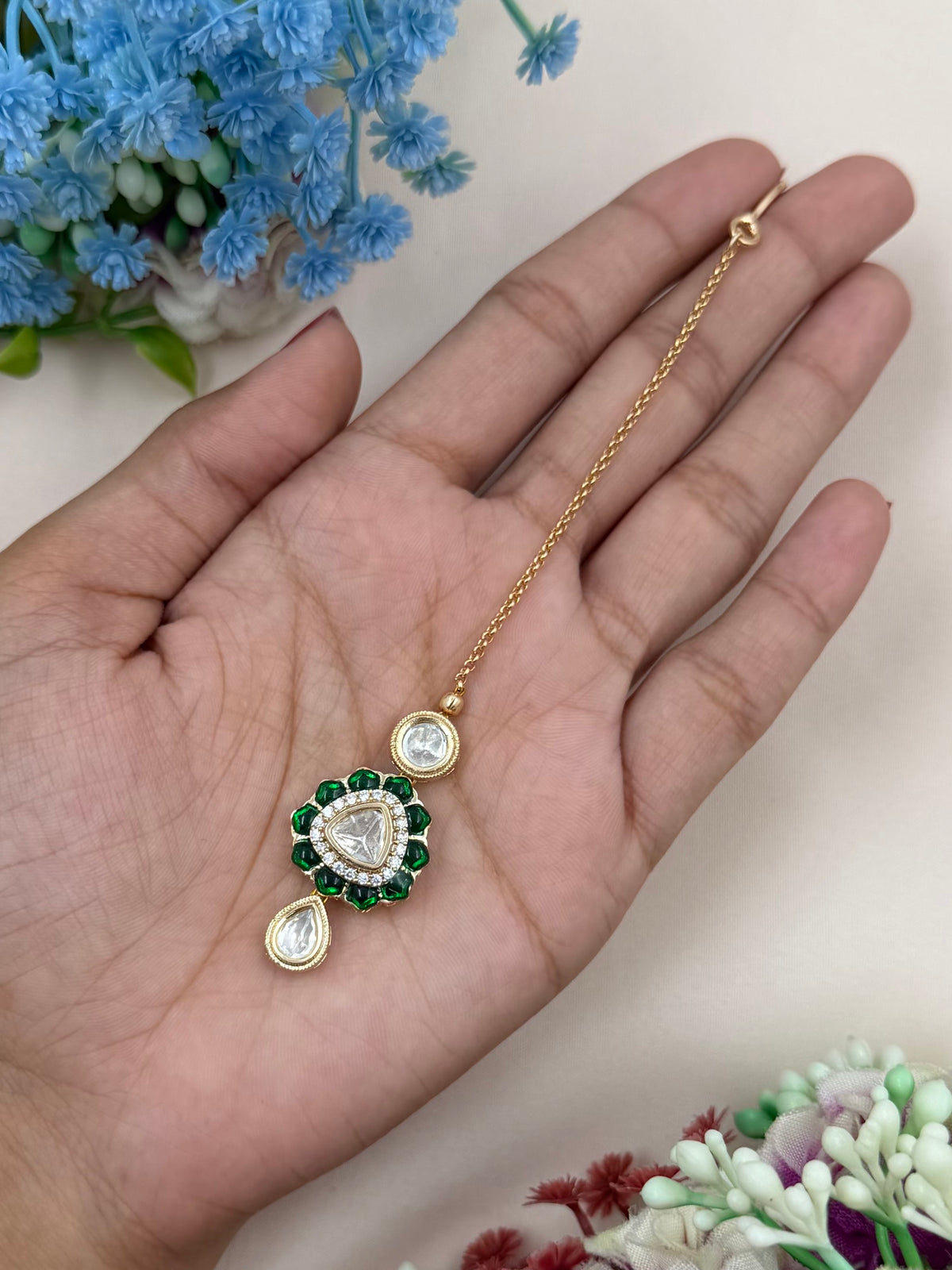 Dropping Moissanite Mang Tika