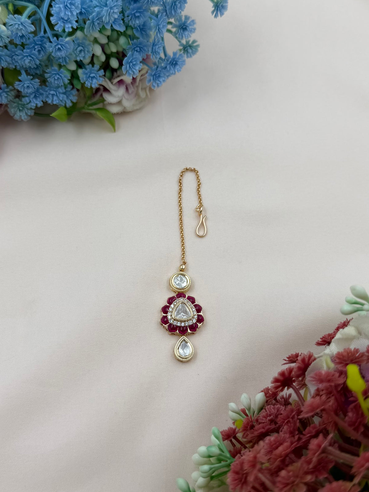 Dropping Moissanite Mang Tika