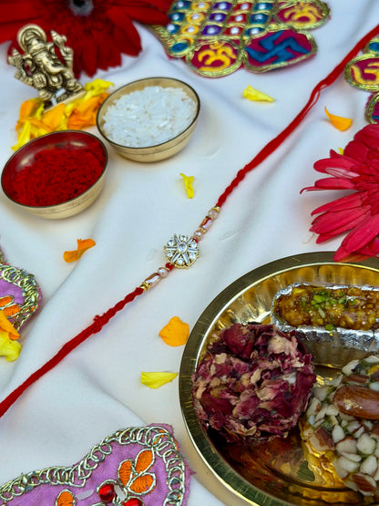 Luxe Flower Spinner Rakhi