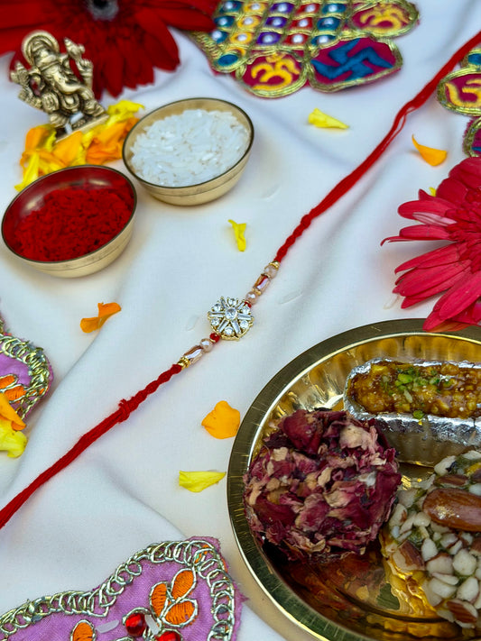 Luxe Flower Spinner Rakhi