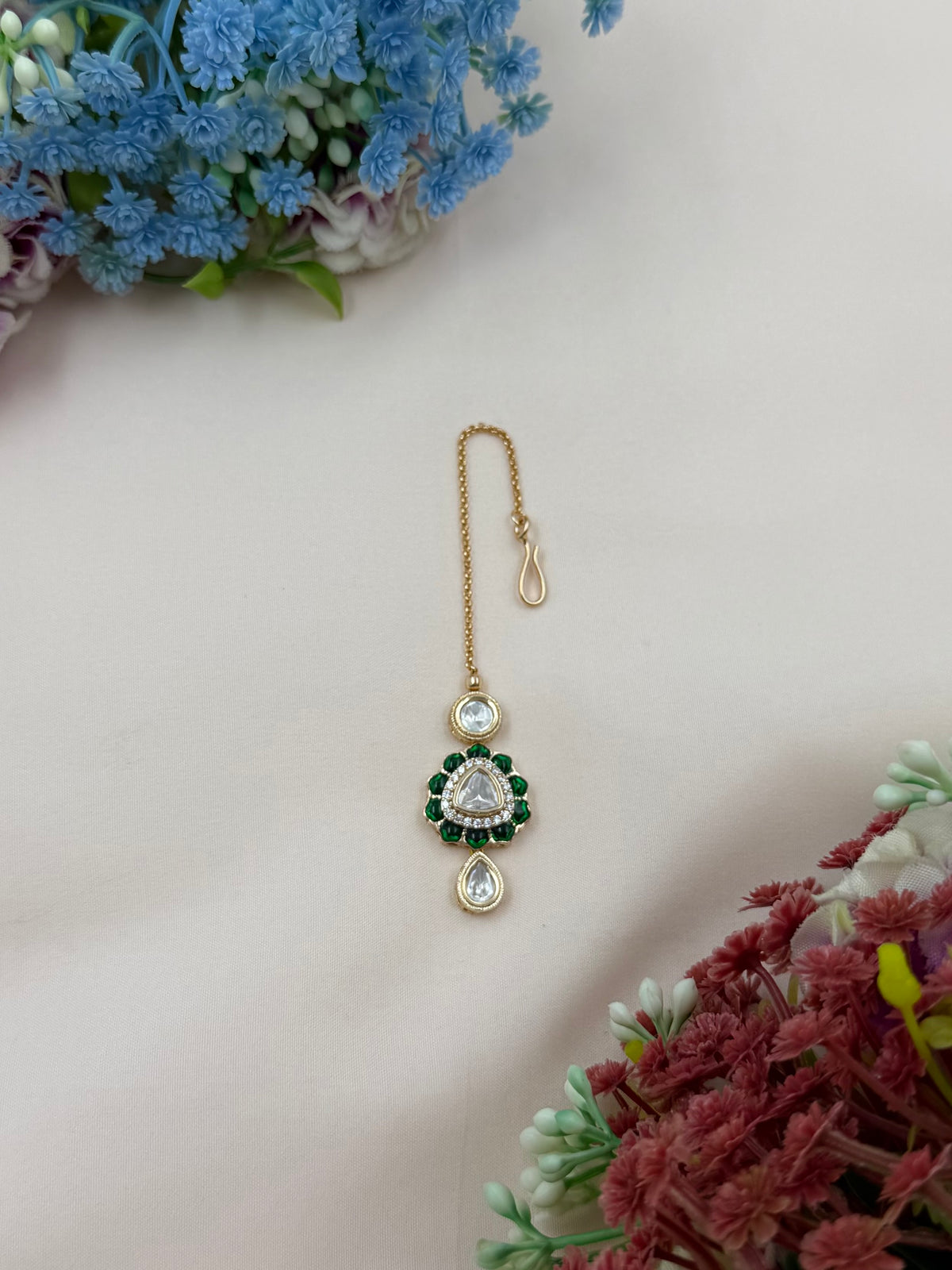Dropping Moissanite Mang Tika