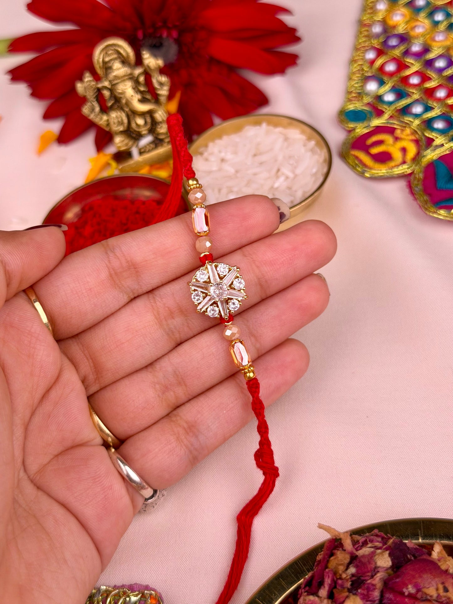 Luxe Flower Spinner Rakhi