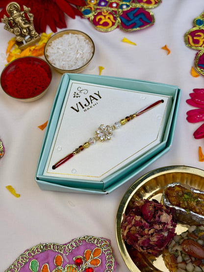 Premium Zircon Flower Spinner Rakhi