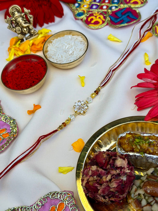 Premium Zircon Flower Spinner Rakhi