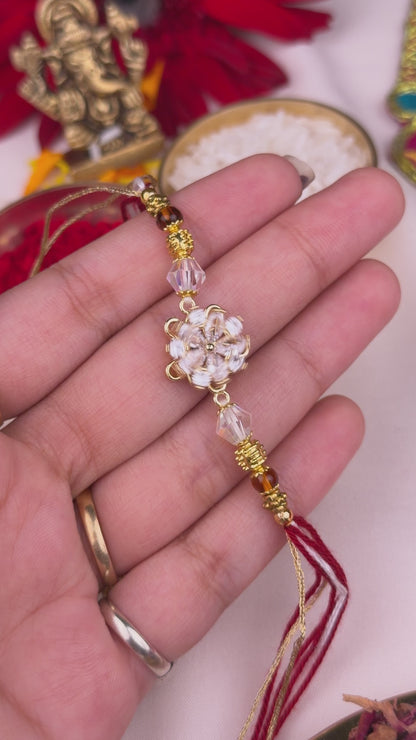 Premium Zircon Flower Spinner Rakhi